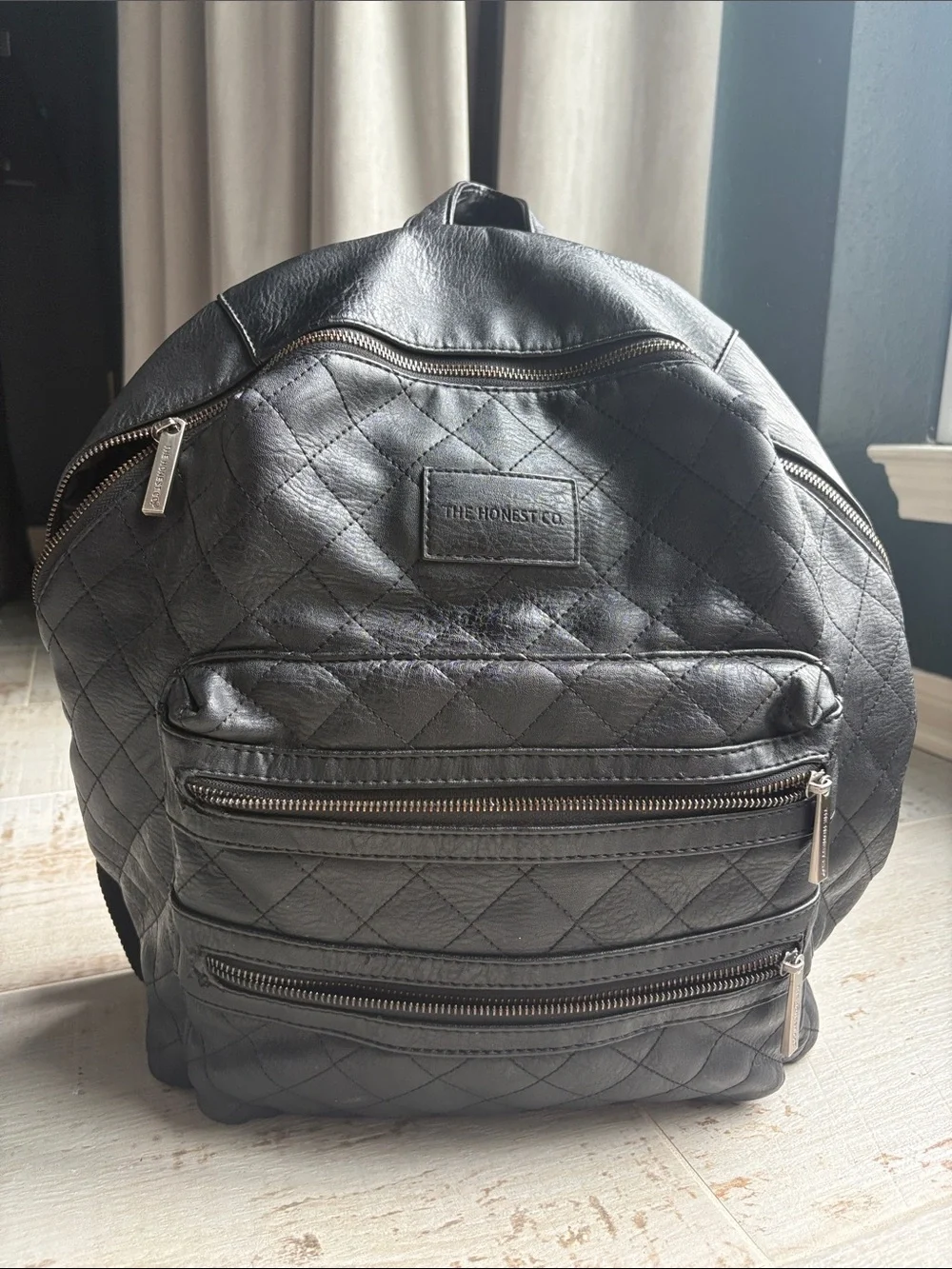 The Honest Company Diamond Quilted Black Faux Leather Backpack